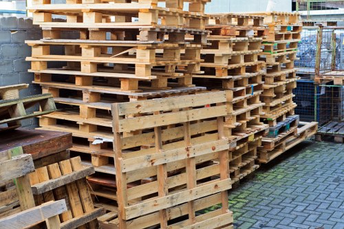 Staff member assisting customer with accessible booking options and alternate formats